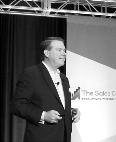 Doug-with-the-Sales-Coaching-Institute-Banner Doug-Dvorak-CEO-The-Sales-Coaching-Institute